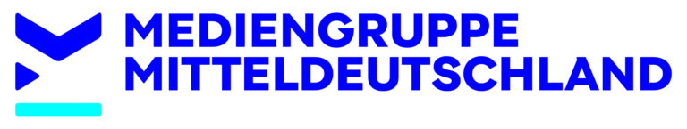 Mediengruppe Mitteldeutschland logo in bold blue text with two leftward blue geometric shapes on a white background.